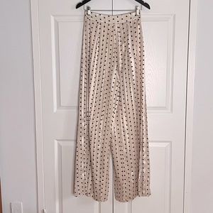 Long polka-dot pants with flowing panels